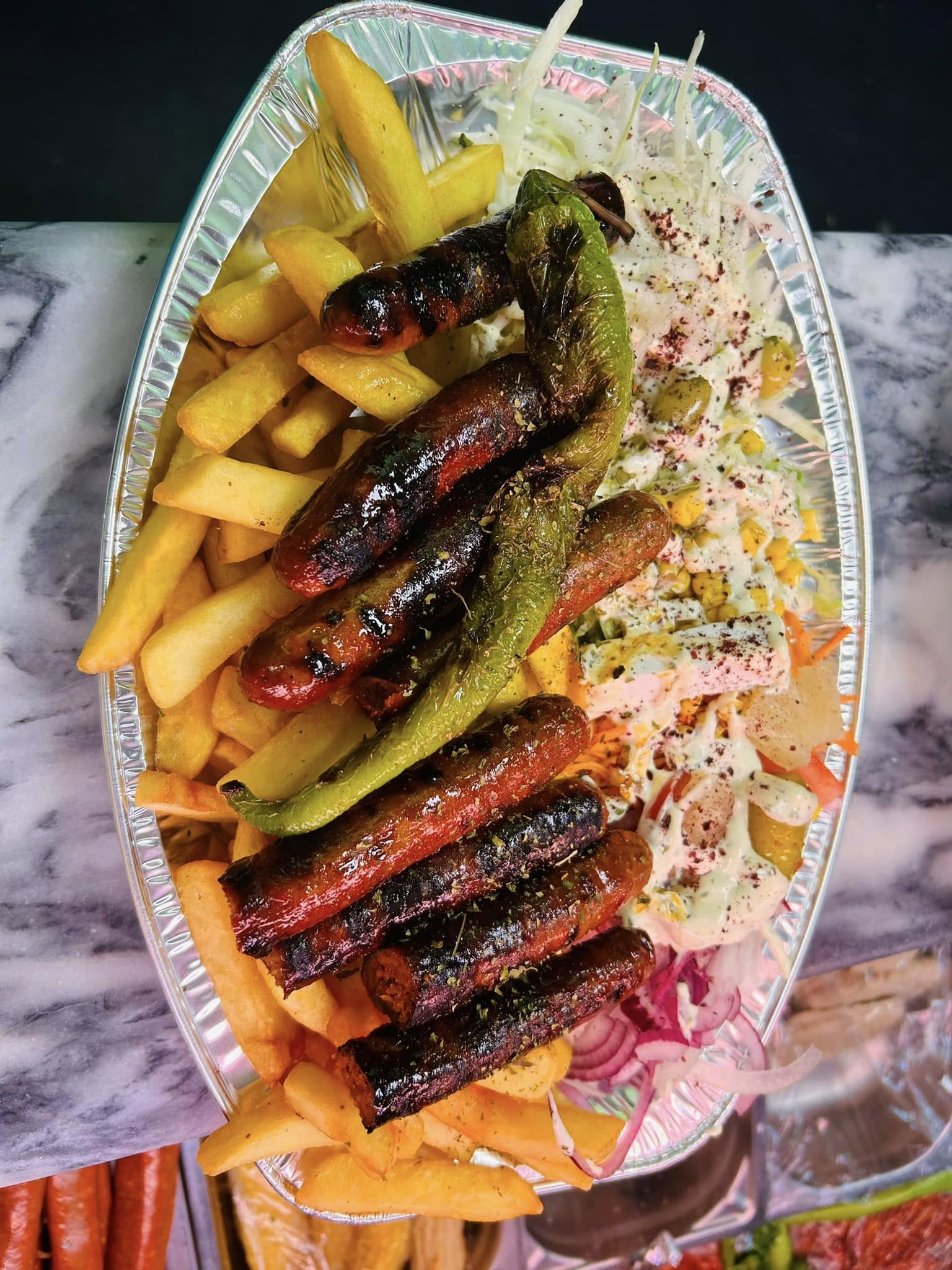 Routier merguez avec frites et crudités